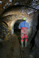 D9 129 Caver in Mine Passage Brownley Hill Mine Nenthead Cumbria